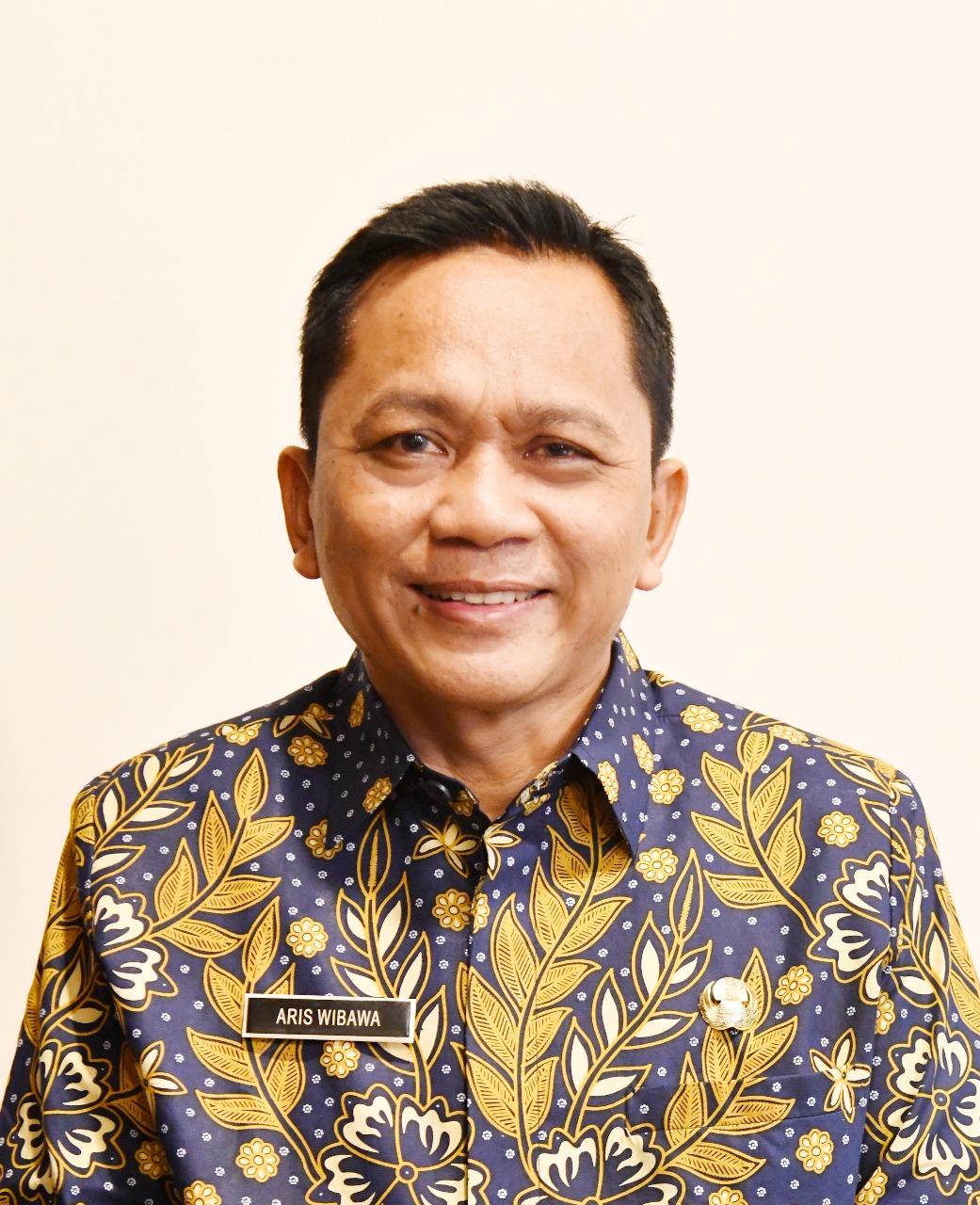 Drs. H. ARIS WIBAWA., M.M